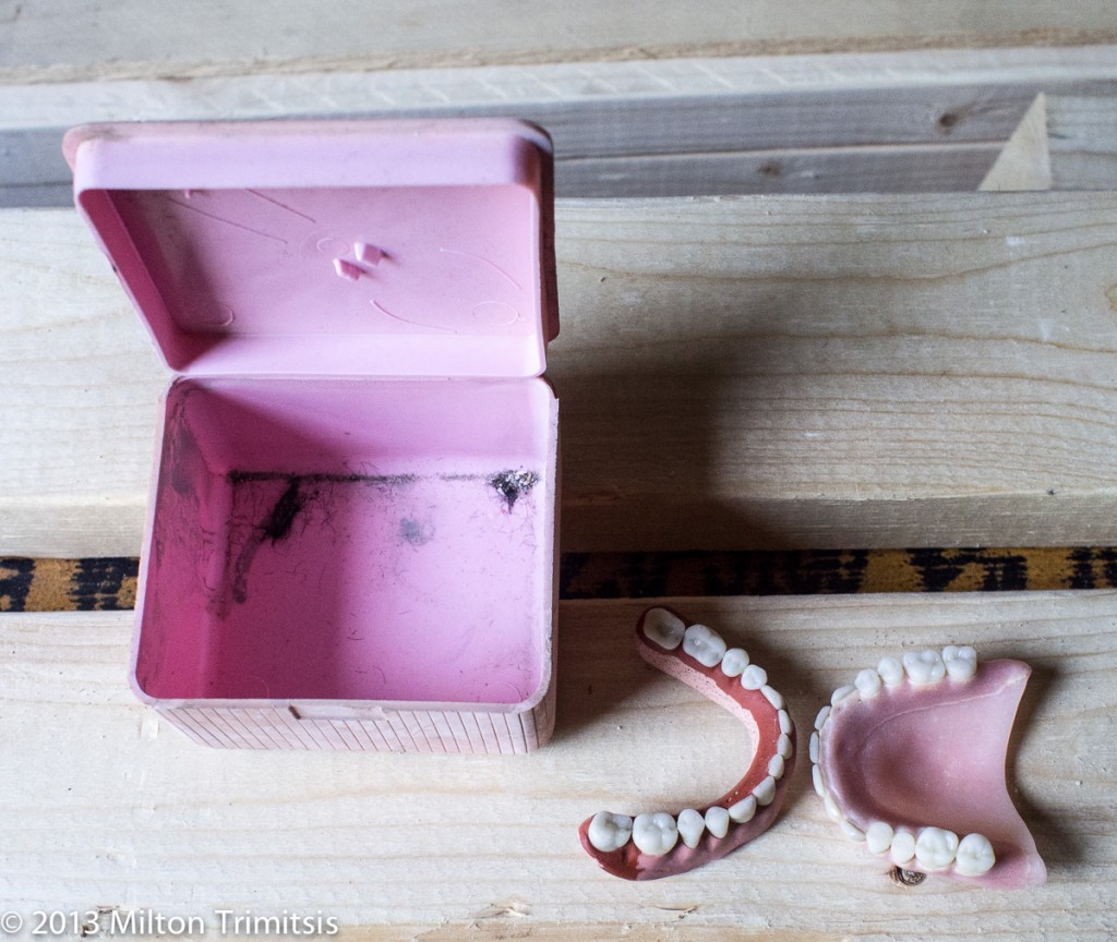 Dentures and plastic box