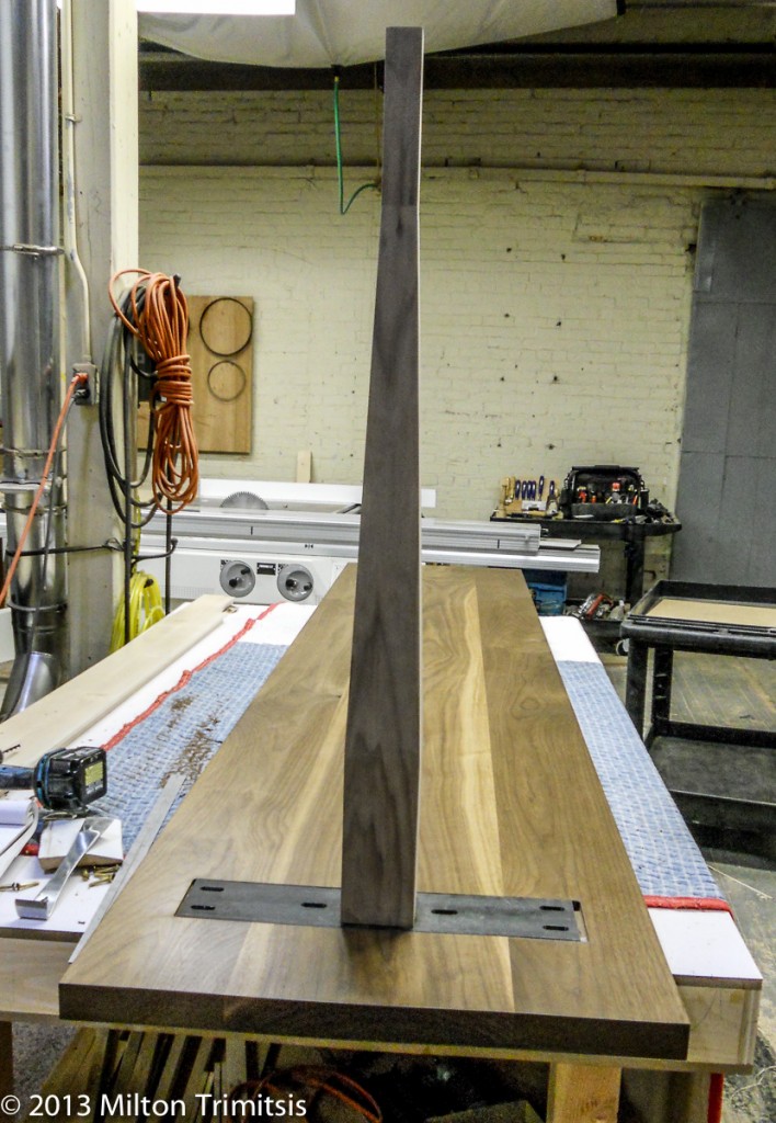 Walnut leg mounted on steel stiffener