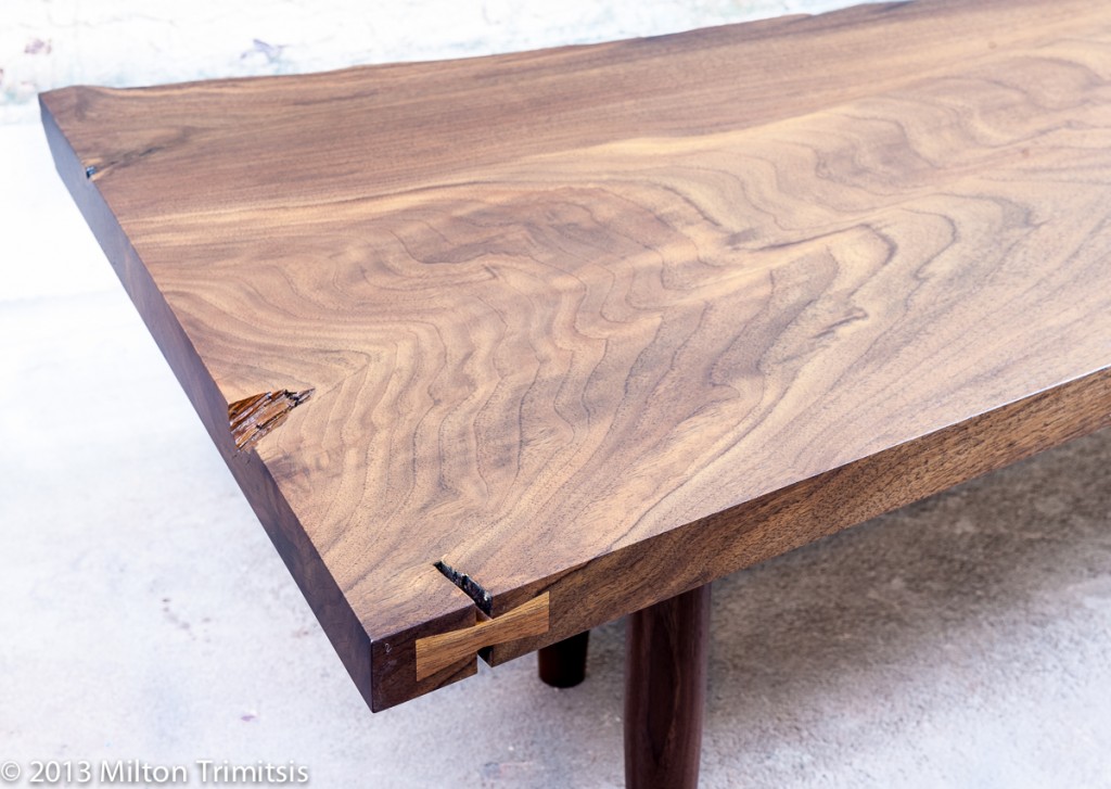 Detail of walnut coffee table in the style of George Nakashima