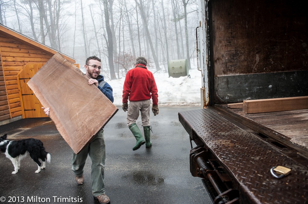 Loading wide walnut board into box truck