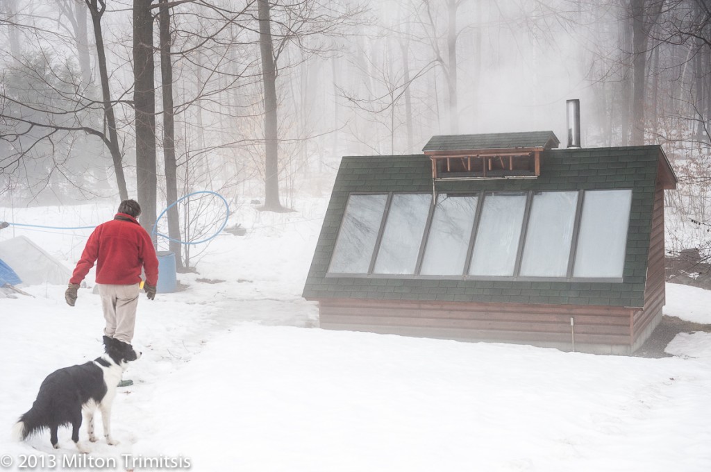 Paul Koval and Luc walking down to sugar house in snow and fog