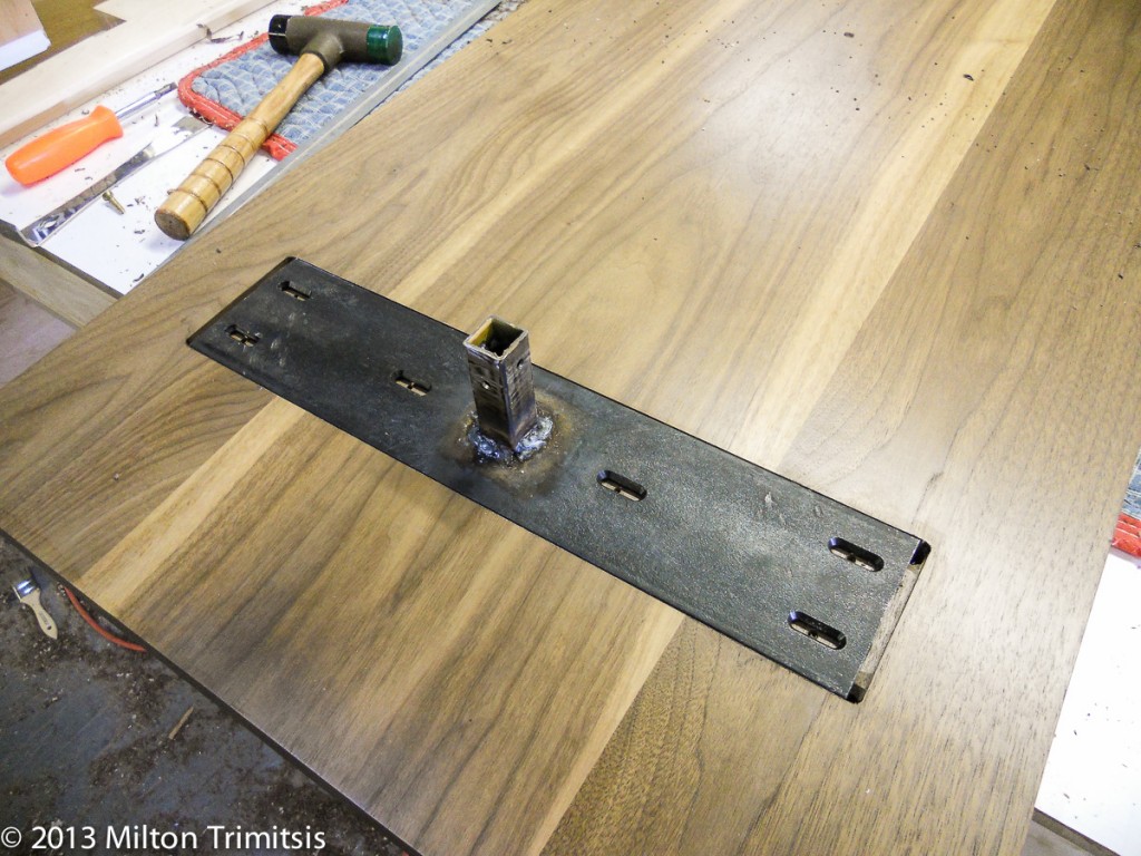 Steel stiffener installed on back of tabletop