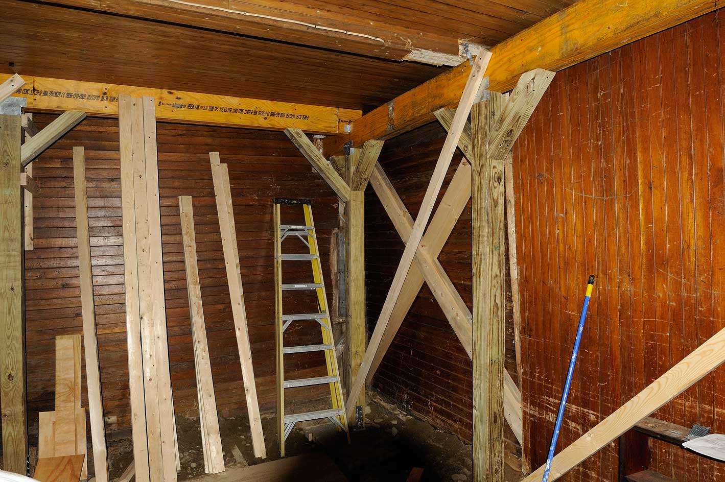 Remedial framing supporting carriage house