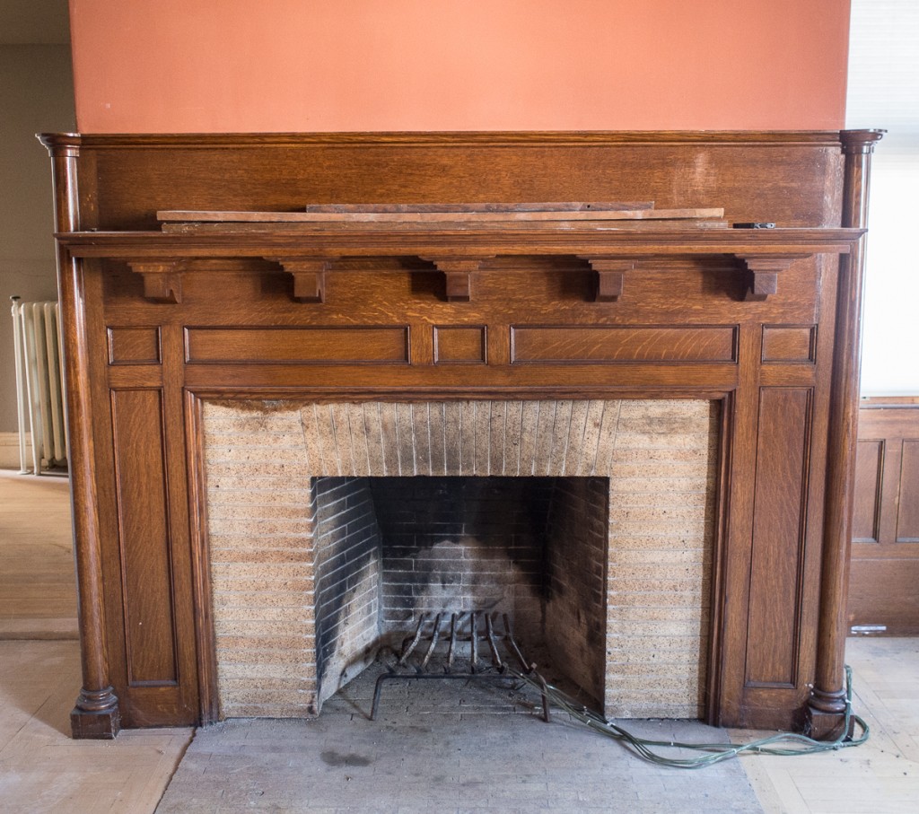 Oak mantel and fireplace from late 19th century